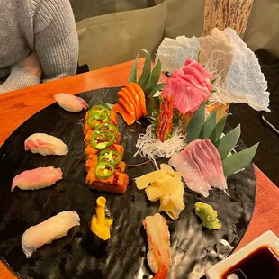 a plate of sushi on a table