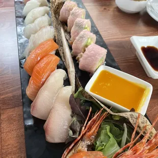 $70 "chef's tasting". This is not a tasting at all. Why 2 pieces each of the cheapest fish? Take a look at the salmon color.