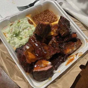 ows a meal in a styrofoam container