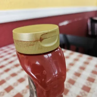 Dried ketchup around the lid.