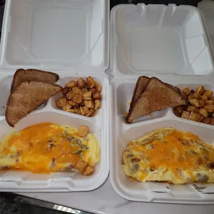 Sorry, you can't see how thin each omelet is.  And these are meat lovers.  One slice of bread cut in half.  Spoon full of potatoes.