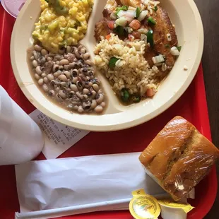 Tilapia Santa Fe with broccoli cheese and rice along with black eye peas and corn bread