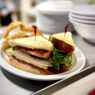 Club Sandwich served with Homemade Onion Rings.