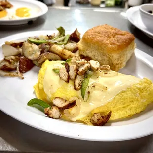 Chicken Fajita Omelette served with home fries and made from scratch biscuit.