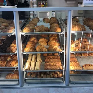 a display case full of baked goods