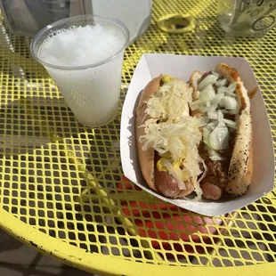 Hot dog with mustard and kraut, chili dog with onion (no cheese) - frozen lemonade for the beverage