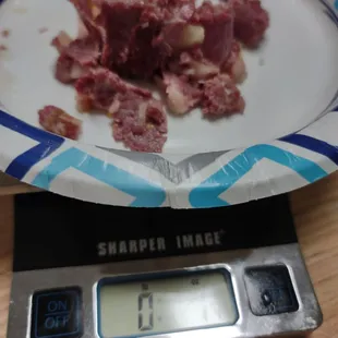 Less than 2 oz of corned beef.