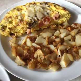 an omelet and potatoes