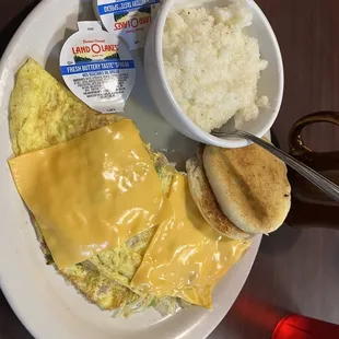 My breakfast western omelette grits English muffin