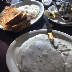 Chicken fried steak , eggs, hash browns and toast