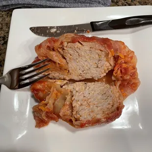 a plate of food with a fork and knife