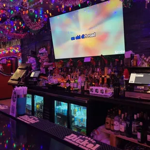 a bar with christmas lights