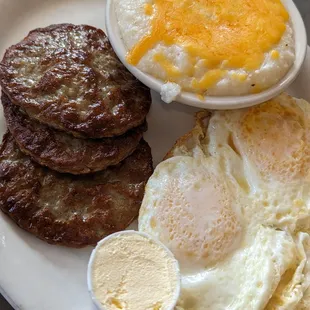 Oh two eggs with sausage and grits and a side of biscuits and gravy not pictured