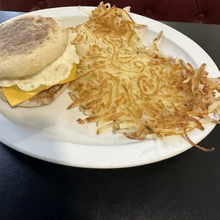 an english muffin, hash browns, and an english muffin sandwich