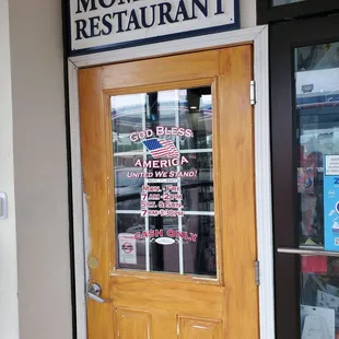 Entry to your left when you step into convenience store vestibule