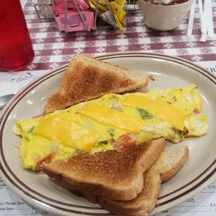 Veggie omelet with cheese and wheat toast