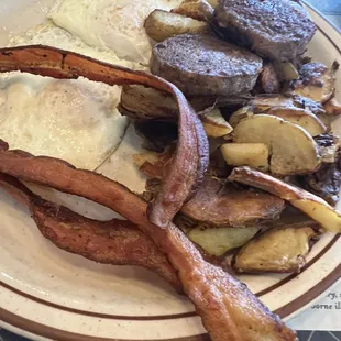 Eggs, bacon, sausage and potatoes