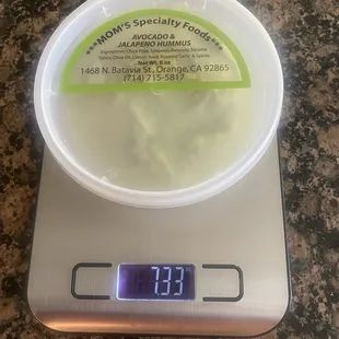 Container of Hummus weighing less than 8oz with th container