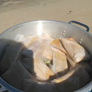 a pot full of tamales