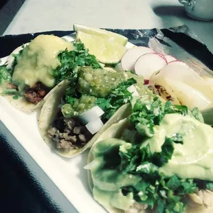 three tacos on a plate