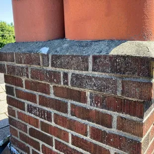 a close up of a brick chimney