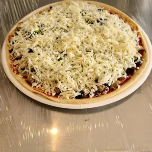 a pizza covered in cheese