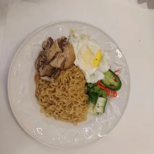 Dry Mi Goreng noodle with 5 spice chicken, egg, and veggies