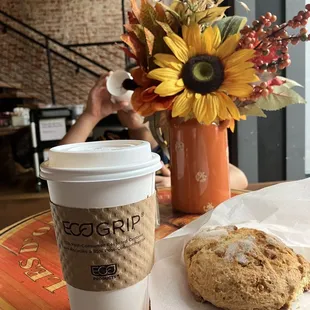 a cup of coffee and a biscuit