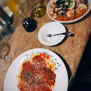 Agnello al ragu (Braised New Zealand lamb shank) / $23 + Linguini pescatore / $25