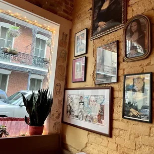 a dining room with a brick wall