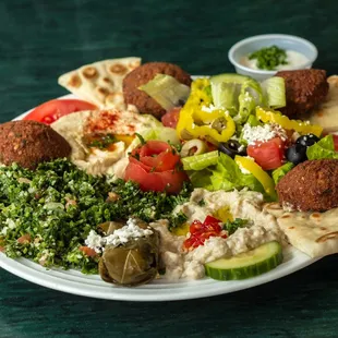 Mona Pita offers tasty Mediterranean Platters, including Vegetarian, Beef Kabob, Chicken Kabob, Lamb Gyro, Shawarma and Mixed Grill Platter.