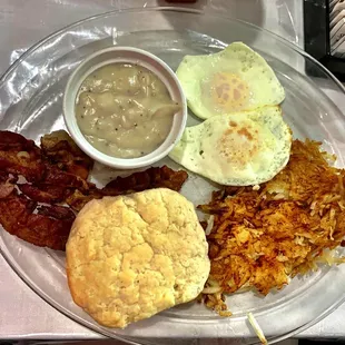 Small Breakfast: 2 Eggs, Bacon, Hashbrowns and Biscuit and Gravy. Very good! Gravy tastes like it's from a package but still really good.