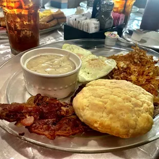 Small Breakfast: 2 Eggs, Bacon, Hashbrowns and Biscuit and gravy. Gravy tastes like it's from a package mix but still really good.