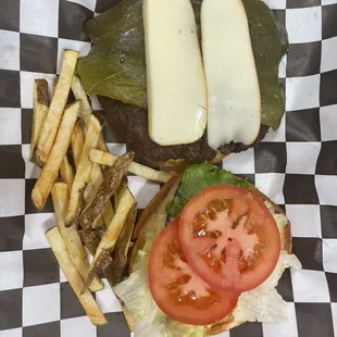 Green chili burger french fries lettuce tomatoes pickles and onions