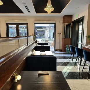 a view of a dining room with a bar