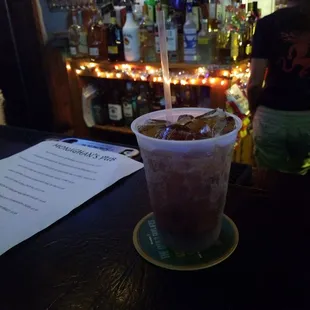 a drink in a plastic cup