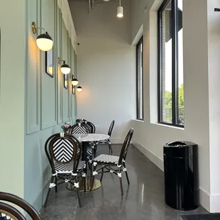 tables and chairs in a coffee shop