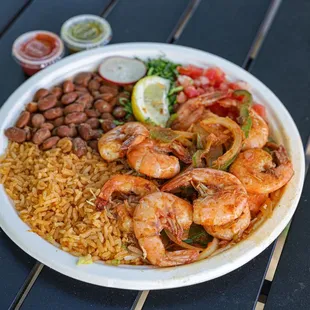 a plate of shrimp and rice