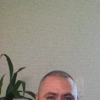 Ernie C.