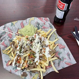 Asada fries &amp; Mexican Coke.