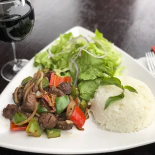 Monarch Shaken Beef, our most popular dish made with the most tender filet mignon stir fried with bell peppers and onions.