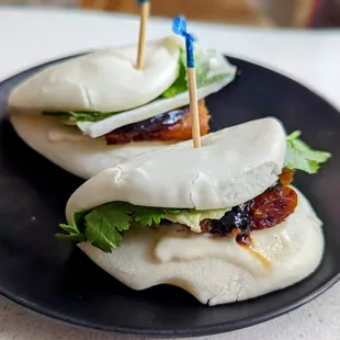 November 6, 2022; Bao buns (pork belly with hoisin, peanuts and cabbage; $13).