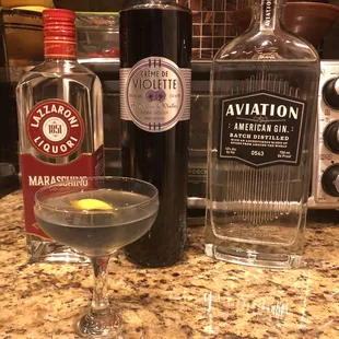 a martini and a bottle of vodka