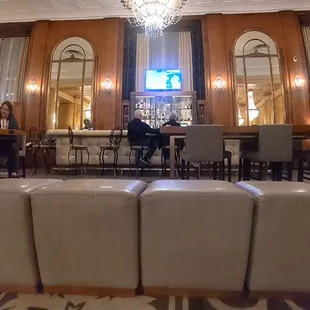 seating area with chandelier and chandelier