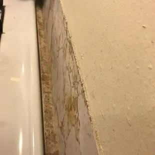 Sticky build up to the right of stove