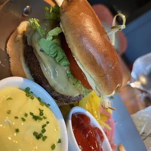 a cheeseburger with fries and ketchup