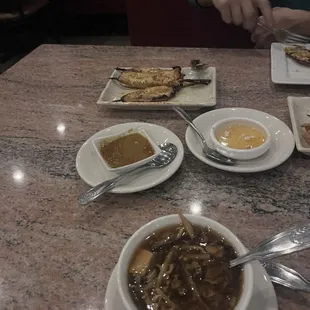 Hot and Sour Soup with pork Chicken Satay (4 Piece)