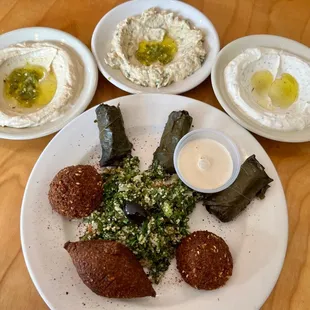 Mona&apos;s Special: hummus, baba ganuj, lebna, grape leaves, tabouli, falafel, kibby