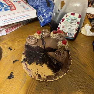 Little to no icing inside after being told it there was a generous amount of frosting "inside" the cake