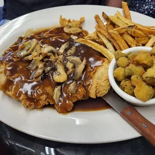 Chicken fried steak and mushroom gravy. Very tender!